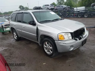 2004 GMC Envoy SLT z VIN 1GKDT13S742130352, wystawiony jako IAAI lot #42355072 z przebiegiem 170 355 mil mil oraz . Historia ofert i sprzedaży dostępna na DreamBid. Obrazek 1.