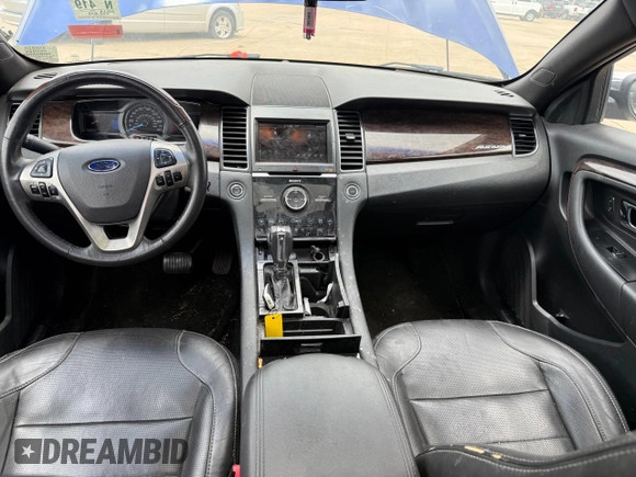 2014 Ford Taurus Limited with VIN 1FAHP2F84EG141388, listed as a Copart auction lot 61052645 with 112,876 mi miles and Clean title. Bid and sale history available at DreamBid. Image 9.