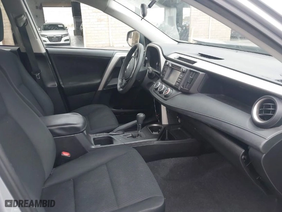 2016 Toyota RAV4 LE with VIN 2T3ZFREV6GW296324, listed as a IAAI auction lot 40922529 with 138,107 mi miles. Bid and sale history available at carsss.com. Image 5.