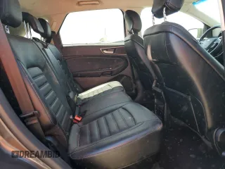 2016 Ford Edge SEL z VIN 2FMPK4J80GBC17489, wystawiony jako Copart lot #58372985 z przebiegiem 131 423 mil mil oraz Szkoda całkowita • Salvage title. Historia ofert i sprzedaży dostępna na DreamBid. Obrazek 11.