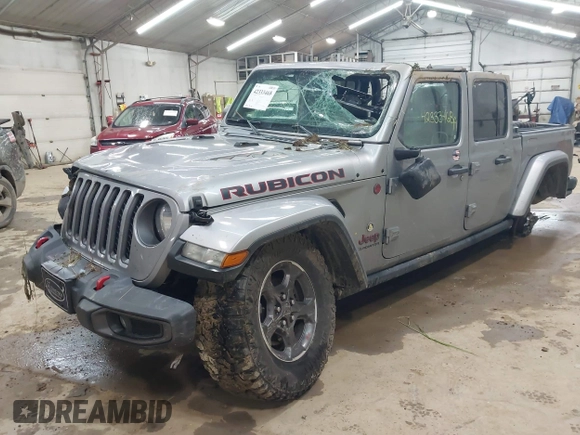 2020 Jeep Gladiator Rubicon with VIN 1C6JJTBGXLL136627, listed as a IAAI auction lot 42333468 with 74,717 mi miles and . Bid and sale history available at DreamBid. Image 2.