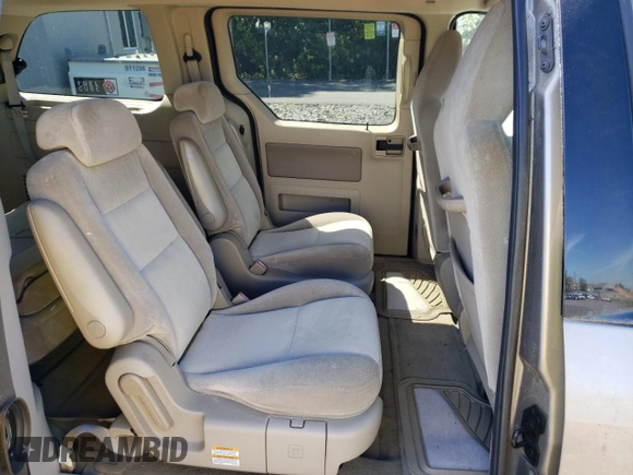 2004 Ford Freestar z VIN 2FMDA57614BA09411, wystawiony jako Copart lot #71191444 z przebiegiem 115 684 mil mil oraz Czysty tytuł • Clean title. Historia ofert i sprzedaży dostępna na DreamBid. Obrazek 11.