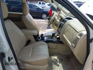 2010 Ford Escape Limited with VIN 1FMCU9E72AKC27235, listed as a IAAI auction lot 42378666 with 112,991 mi miles and . Bid and sale history available at DreamBid. Image 5.
