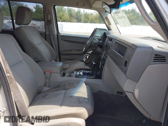 2007 Jeep Commander Sport z VIN 1J8HG48P17C695954, wystawiony jako IAAI lot #42106559 z przebiegiem Nie podano mil oraz . Historia ofert i sprzedaży dostępna na DreamBid. Obrazek 5.