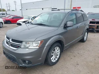 2013 Dodge Journey SXT with VIN 3C4PDDBGXDT650886, listed as a IAAI auction lot 41864331 with 224,579 mi miles and . Bid and sale history available at DreamBid. Image 2.
