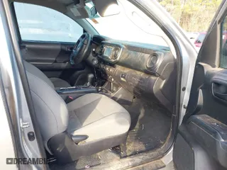 2016 Toyota Tacoma SR with VIN 5TFCZ5ANXGX037133, listed as a IAAI auction lot 41312910 with 153,157 mi miles. Bid and sale history available at carsss.com. Image 5.