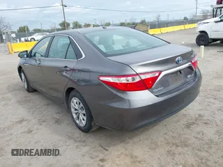 2017 Toyota Camry Hybrid LE with VIN 4T1BD1FK9HU216117, listed as a IAAI auction lot 41710989 with 99,595 mi miles. Bid and sale history available at carsss.com. Image 3.