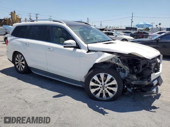 2019 Mercedes-Benz GLS 450 with VIN 4JGDF6EE9KB222613, listed as a Copart auction lot 59233025 with 73,660 mi miles and Salvage title. Bid and sale history available at DreamBid. Image 4.