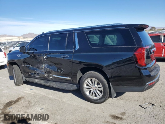 2021 GMC Yukon XL SLT with VIN 1GKS2GKD0MR471504, listed as a Copart auction lot 81838794 with 55,917 mi miles and Salvage Title. Bid and sale history available at carsss.com. Image 2.