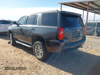 2015 Chevrolet Tahoe LS with VIN 1GNSCAKC9FR122896, listed as a IAAI auction lot 42239812 with 164,888 mi miles and . Bid and sale history available at DreamBid. Image 3.