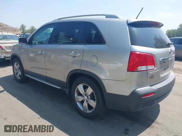 2013 Kia Sorento EX with VIN 5XYKUDA65DG352577, listed as a IAAI auction lot 42174829 with 175,500 mi miles and . Bid and sale history available at DreamBid. Image 3.