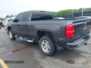 2014 Chevrolet Silverado 1500 LT with VIN 1GCRCREC5EZ161985, listed as a IAAI auction lot 42096479 with 225,412 mi miles and . Bid and sale history available at DreamBid. Image 3.