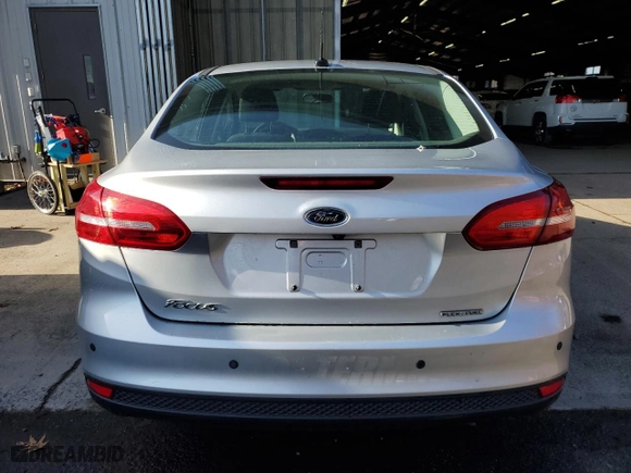 2016 Ford Focus S with VIN 1FADP3E25GL298679, listed as a Copart auction lot 84890044 with 218,985 mi miles and Clean Title. Bid and sale history available at carsss.com. Image 6.