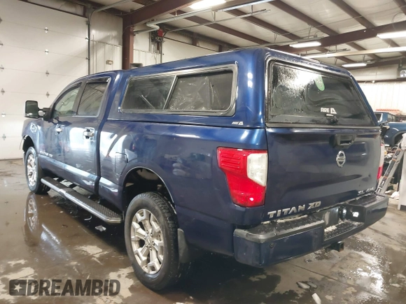 2017 Nissan Titan Pro-4X z VIN 1N6BA1F44HN551551, wystawiony jako IAAI lot #41581877 z przebiegiem 64 834 mil mil oraz . Historia ofert i sprzedaży dostępna na DreamBid. Obrazek 3.
