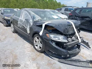 2015 Volkswagen CC R-Line with VIN WVWBP7AN9FE823240, listed as a IAAI auction lot 41697065 with 1 mi miles. Bid and sale history available at carsss.com. Image 1.