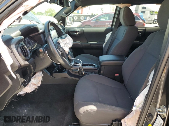 2018 Toyota Tacoma SR with VIN 3TMCZ5AN5JM162716, listed as a Copart auction lot 56479985 with 71,627 mi miles and Salvage Title. Bid and sale history available at DreamBid. Image 7.