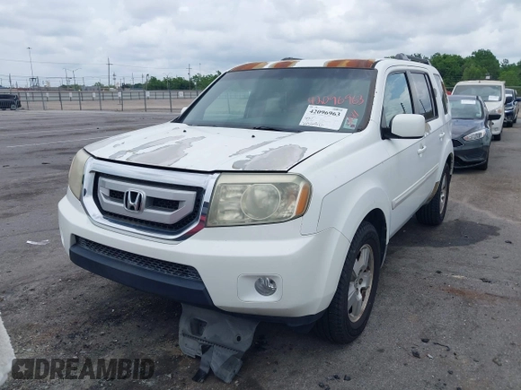 2011 Honda Pilot EX with VIN 5FNYF3H48BB029583, listed as a IAAI auction lot 42096963 with 263,545 mi miles and . Bid and sale history available at carsss.com. Image 12.