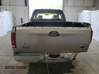 2003 Ford F-150 XL with VIN 1FTRX17283NA46215, listed as a Copart auction lot 85194094 with 168,415 mi miles and Salvage title. Bid and sale history available at DreamBid. Image 6.