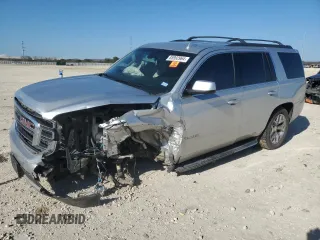 2015 GMC Yukon SLE with VIN 1GKS1AKC1FR716322, listed as a Copart auction lot 85992964 with 141,552 mi miles and Salvage Title. Bid and sale history available at carsss.com. Image 1.