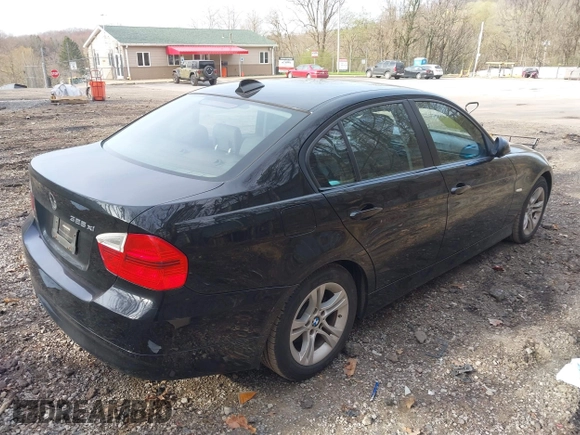 2008 BMW 3 Series 328xi with VIN WBAVC93508K043288, listed as a IAAI auction lot 42060130 with 183,882 mi miles. Bid and sale history available at carsss.com. Image 4.