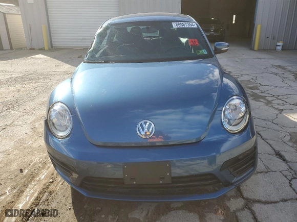 2019 Volkswagen Beetle S with VIN 3VWFD7AT3KM710264, listed as a Copart auction lot 80667354 with 53,821 mi miles and Salvage Title. Bid and sale history available at carsss.com. Image 5.