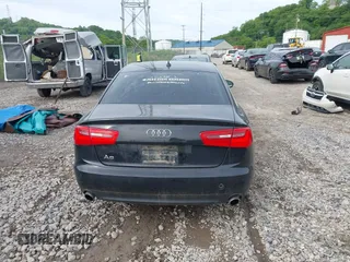 2014 Audi A6 Premium Plus z VIN WAUGFAFCXEN065126, wystawiony jako IAAI lot #42333403 z przebiegiem 121 467 mil mil oraz . Historia ofert i sprzedaży dostępna na DreamBid. Obrazek 16.
