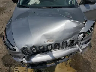 2015 Jeep Cherokee Sport with VIN 1C4PJLAB7FW536303, listed as a Copart auction lot 56233885 with 150,883 mi miles and Salvage title. Bid and sale history available at DreamBid. Image 12.