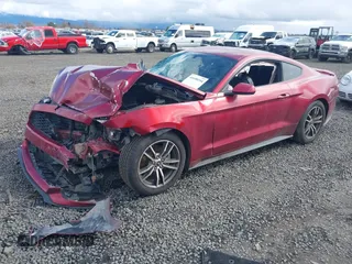 2016 Ford Mustang EcoBoost with VIN 1FA6P8TH0G5203043, listed as a IAAI auction lot 41690194 with Not provided miles and . Bid and sale history available at DreamBid. Image 16.