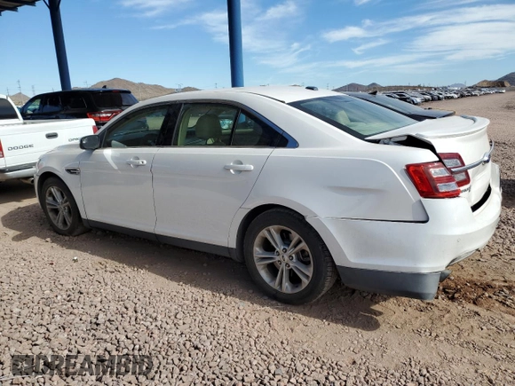 2015 Ford Taurus SEL with VIN 1FAHP2E92FG172960, listed as a Copart auction lot 79465914 with 115,115 mi miles and Salvage Title. Bid and sale history available at DreamBid. Image 2.