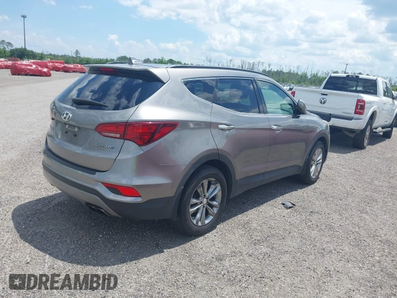 2018 Hyundai Santa Fe 2.0T с VIN 5NMZU4LAXJH057363, выставлен на аукционе IAAI как лот 42265981 с пробегом 118 536 миль миль и . История ставок и продаж доступна на DreamBid. Изображение 4.