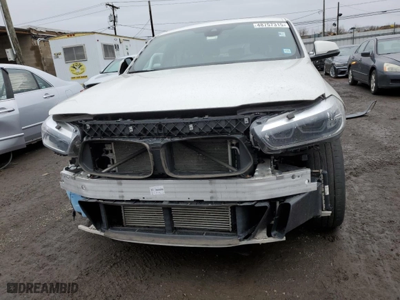2022 BMW X2 xDrive28i with VIN WBXYJ1C04N5T43098, listed as a Copart auction lot 48757315 with 63,716 mi miles and Salvage Title. Bid and sale history available at carsss.com. Image 5.