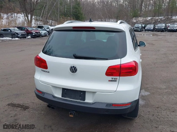 2017 Volkswagen Tiguan Wolfsburg Edition with VIN WVGSV7AX5HK014969, listed as a IAAI auction lot 41742345 with 63,225 mi miles. Bid and sale history available at carsss.com. Image 17.