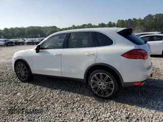 2012 Porsche Cayenne with VIN WP1AA2A2XCLA10081, listed as a Copart auction lot 55394935 with 181,316 mi miles and Salvage title. Bid and sale history available at DreamBid. Image 2.