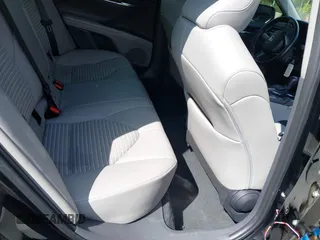 2023 Toyota Camry SE with VIN 4T1G11AK6PU741172, listed as a IAAI auction lot 41599909 with 56,668 mi miles and . Bid and sale history available at DreamBid. Image 8.