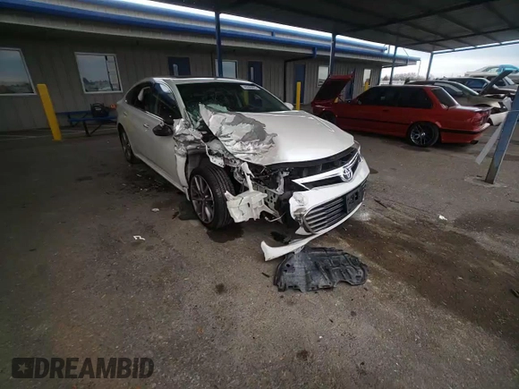 2014 Toyota Avalon Limited with VIN 4T1BK1EB1EU111901, listed as a Copart auction lot 45246655 with 118,703 mi miles and Salvage Title. Bid and sale history available at carsss.com. Image 10.