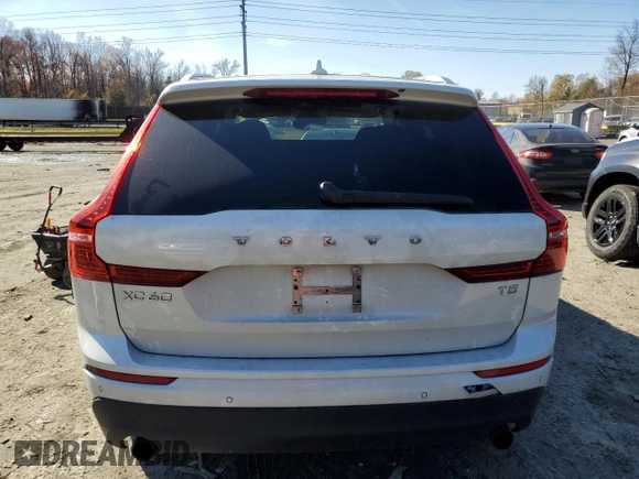 2021 Volvo XC60 Momentum z VIN YV4102DK3M1760366, wystawiony jako Copart lot #81169744 z przebiegiem 52 405 mil mil oraz Szkody całkowita. Historia ofert i sprzedaży dostępna na DreamBid. Obrazek 6.