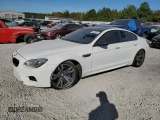 2015 BMW M6 z VIN WBS6C9C58FD467867, wystawiony jako Copart lot #75966844 z przebiegiem 94 102 mil mil oraz Szkody całkowita. Historia ofert i sprzedaży dostępna na DreamBid. Obrazek 1.