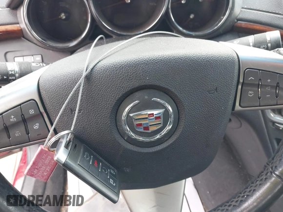 2011 Cadillac CTS Performance with VIN 1G6DJ5ED0B0160778, listed as a IAAI auction lot 41598549 with 167,144 mi miles and . Bid and sale history available at DreamBid. Image 11.