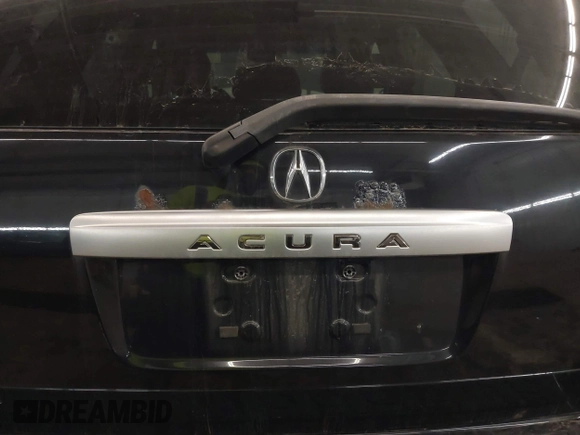 2004 Acura MDX with VIN 2HNYD18254H511752, listed as a IAAI auction lot 41387382 with 217,074 mi miles. Bid and sale history available at carsss.com. Image 6.