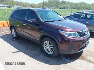 2015 Kia Sorento LX with VIN 5XYKTDA70FG604220, listed as a IAAI auction lot 42060598 with 128,180 mi miles and . Bid and sale history available at DreamBid. Image 1.