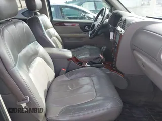 2003 GMC Envoy SLT with VIN 1GKDT13SX32161898, listed as a IAAI auction lot 41642072 with 230,154 mi miles. Bid and sale history available at carsss.com. Image 5.