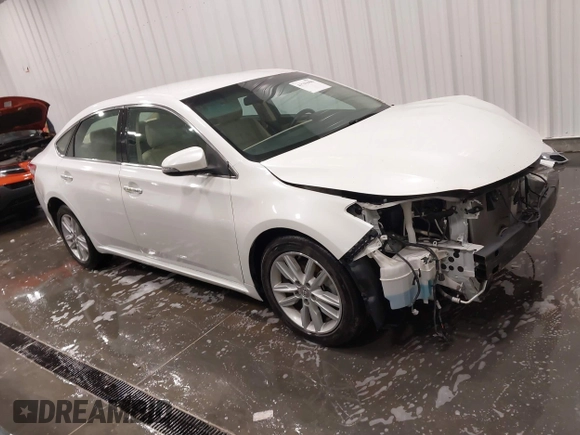 2014 Toyota Avalon Limited with VIN 4T1BK1EB1EU088538, listed as a IAAI auction lot 41793990 with 75,244 mi miles. Bid and sale history available at carsss.com. Image 1.