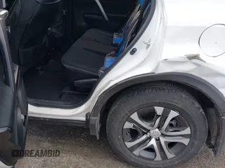 2018 Toyota RAV4 LE with VIN JTMBFREV5JJ738405, listed as a IAAI auction lot 41956145 with 100,593 mi miles and . Bid and sale history available at DreamBid. Image 18.