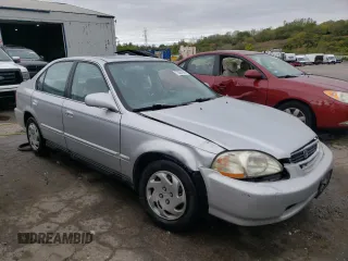 1997 Honda Civic EX with VIN 1HGEJ8647VL018949, listed as a Copart auction lot 72557904 with 162,531 mi miles and Salvage Title. Bid and sale history available at carsss.com. Image 4.