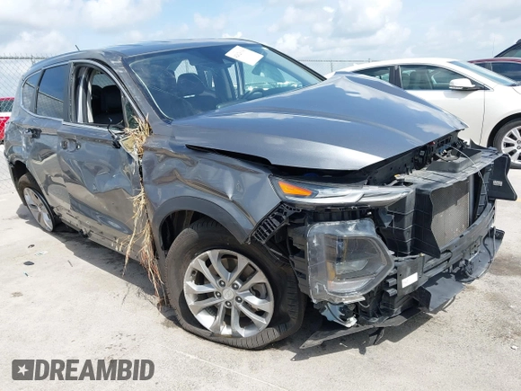 2019 Hyundai Santa Fe SE with VIN 5NMS23AD2KH108936, listed as a IAAI auction lot 42626196 with 72,757 mi miles and . Bid and sale history available at DreamBid. Image 1.