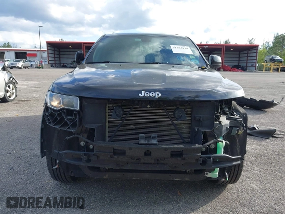 2017 Jeep Grand Cherokee Laredo with VIN 1C4RJEAG5HC663930, listed as a IAAI auction lot 41684918 with 91,063 mi miles. Bid and sale history available at carsss.com. Image 13.