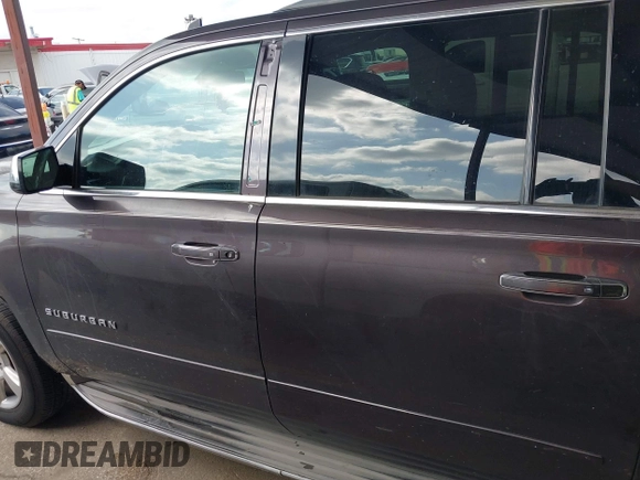2015 Chevrolet Suburban LTZ with VIN 1GNSCKKC7FR272138, listed as a IAAI auction lot 42047823 with 198,314 mi miles and . Bid and sale history available at DreamBid. Image 14.