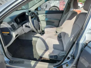 2007 Kia Spectra EX with VIN KNAFE121075394066, listed as a Copart auction lot 63238165 with 234,287 mi miles and Salvage title. Bid and sale history available at DreamBid. Image 7.