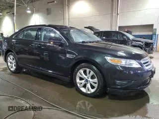 2010 Ford Taurus SEL with VIN 1FAHP2EW5AG109379, listed as a Copart auction lot 50165305 with 128,690 mi miles and Clean Title. Bid and sale history available at DreamBid. Image 4.