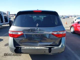 2011 Honda Odyssey EX-L with VIN 5FNRL5H6XBB083980, listed as a IAAI auction lot 42100308 with 191,361 mi miles and . Bid and sale history available at carsss.com. Image 16.